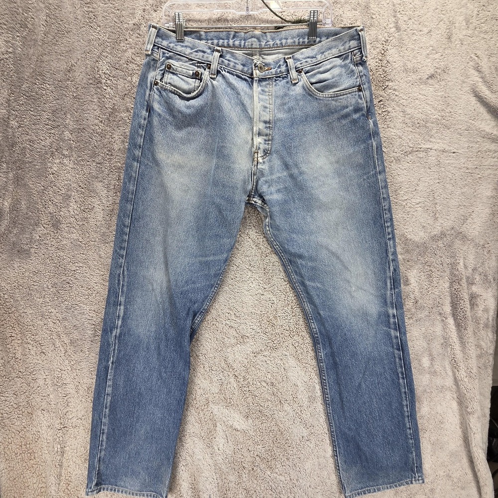 Vintage Levis 501 Jeans Mens Blue Light Wash Made In USA Button Fly Fits 34x30
